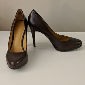 Brown leather pumps